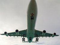 The cloud cover rolled in about 15-30 minutes before this Air France A340-300 came in from Paris kind of ruining the shot. At this point I would guess it&#39;s about 50-60 ft overhead which may seem like a lot but it&#39;s not when 150 tonnes of steel passes over your head at 250 km/h. It certainly gets your attention!